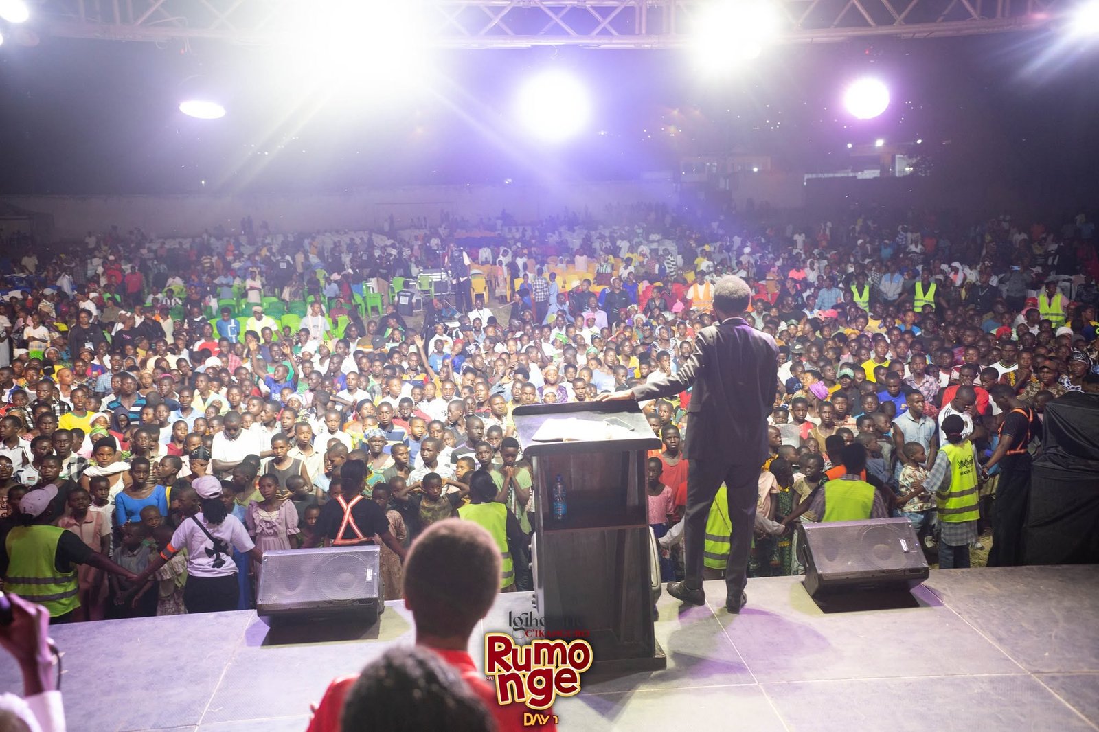 Preaching the Gospel to the crowd at the Rumonge Revival Crusade